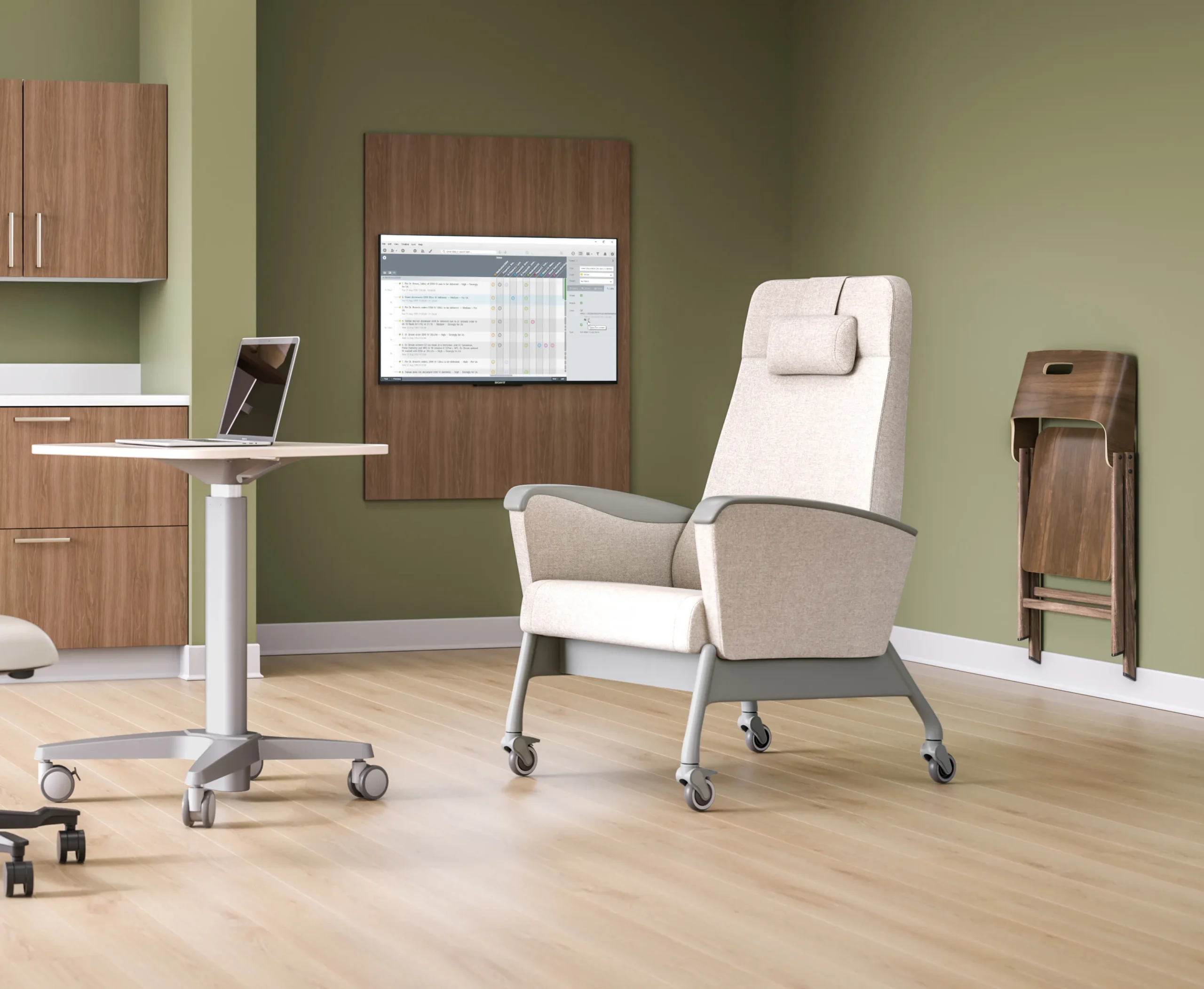 white patient chair in a room with green walls