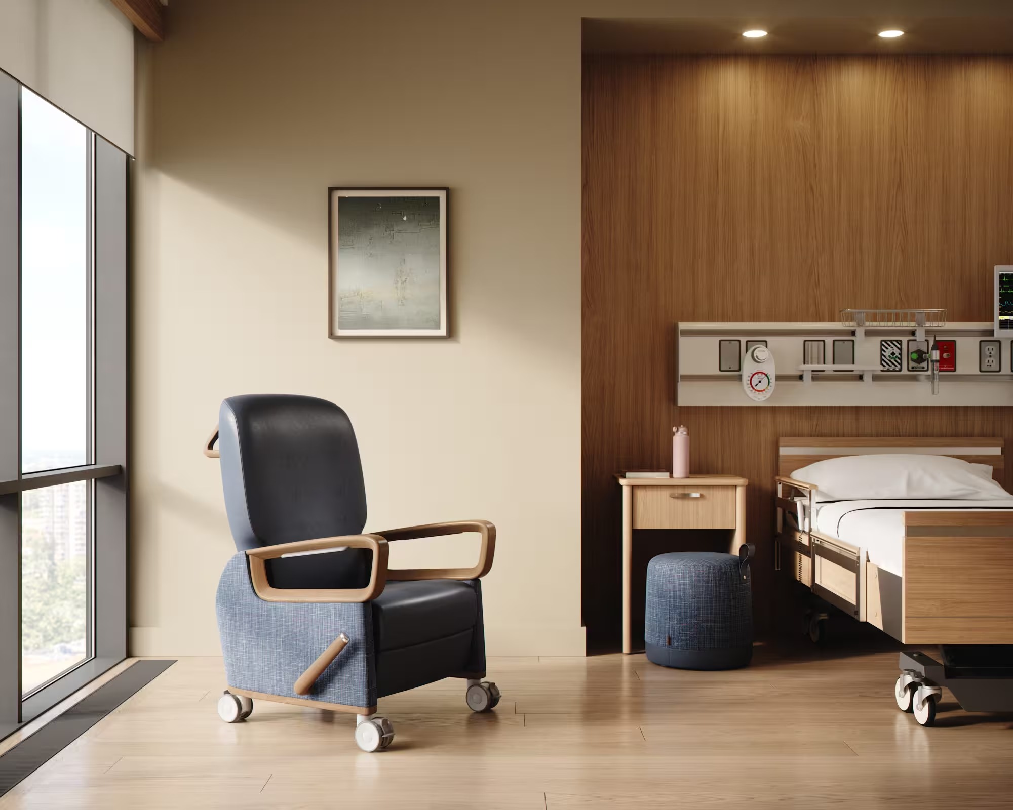 patient room with a bed and a blue arm chair