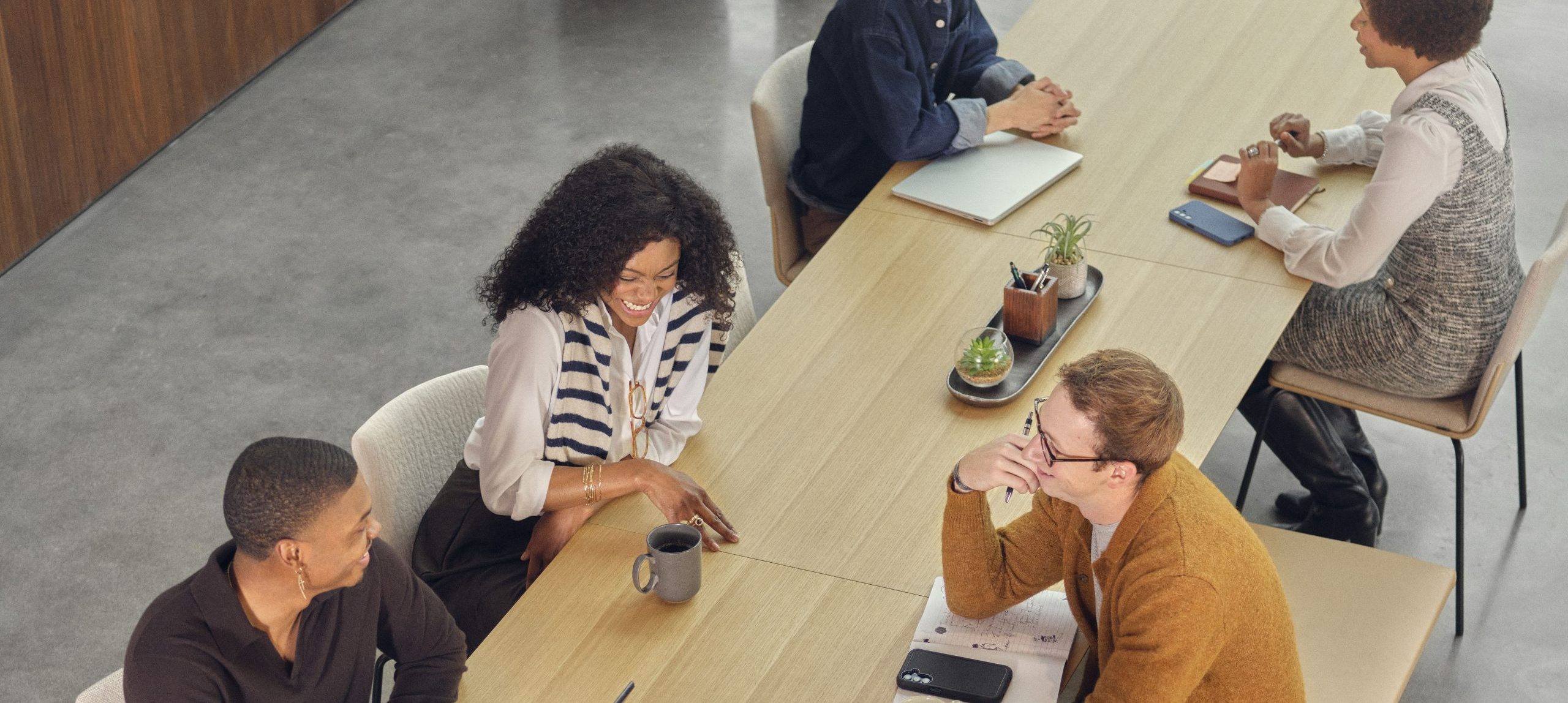 people talking at a table