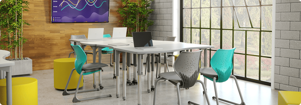 grey desk with mint color and yellow chairs